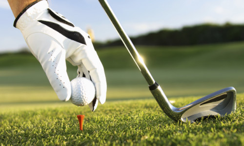 Golfer about to tee off