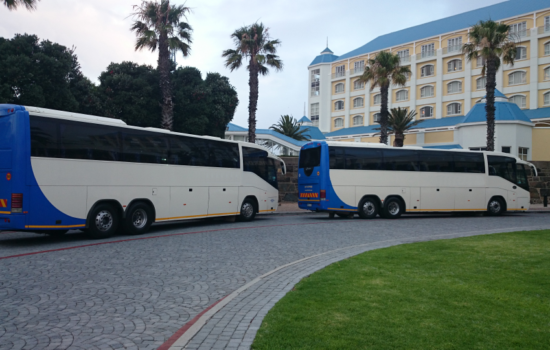 60 Seater semi-luxury coaches parking at hotel in South Africa
