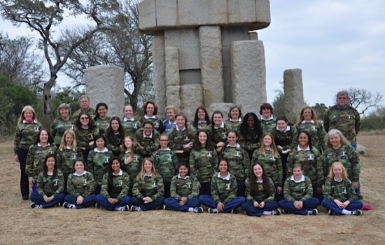 School Girls Having Photo Taken at Monument